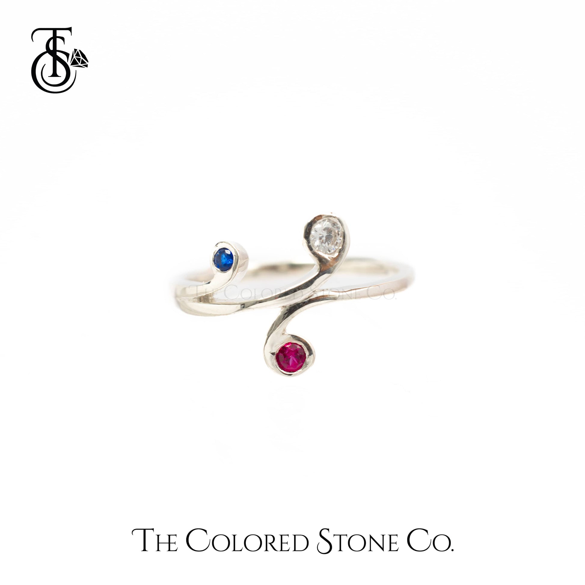 Waves Ring featuring stunning Sapphire Blue Cubic Zirconia, luxurious Lab Grown Ruby, and sparkling White Cubic Zirconia